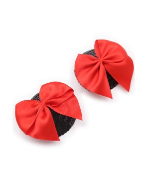 Paire de cache tétons adhésifs noir avec nœud papillon rouge