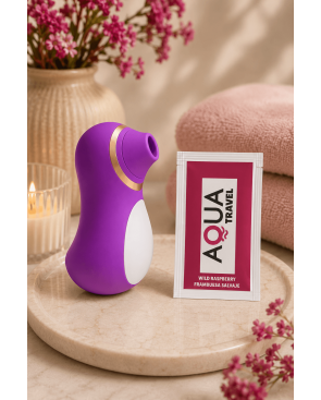 Stimulateur Clitoridien Pingouin à Langue Fuchsia  1 dosette de lubrifiant — Pocket Pleasure