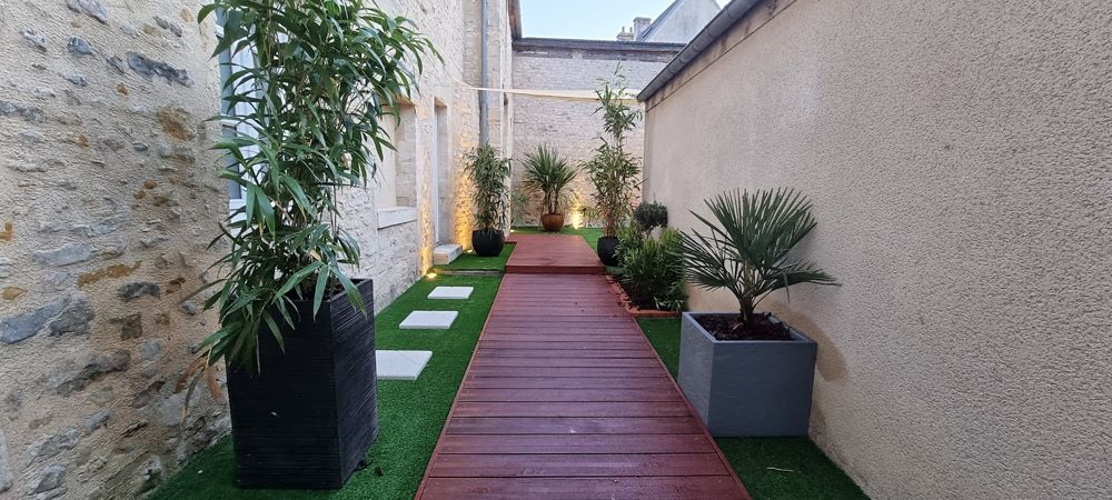 Photo Google Maps · La Bayeuzen - Le Jardin - Jacuzzi Privatif dans la chambre